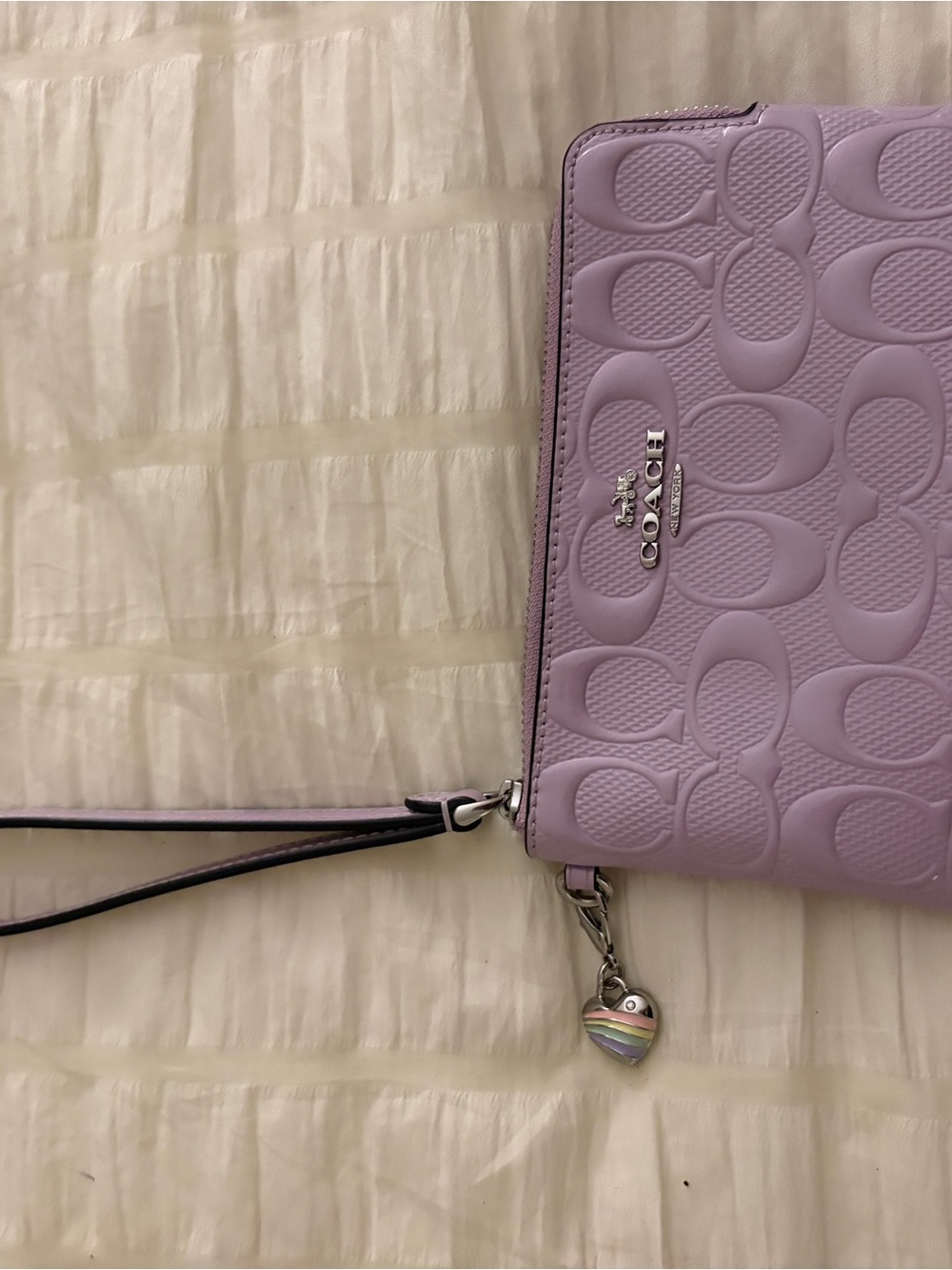 COACH Lavender Embossed Leather Wristlet with Heart Charm